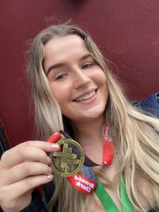 Global Connects staff with Kiltwalk medal